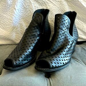 Woman’s peep toe ankle boot